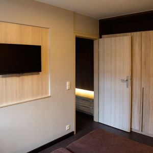Sypialnia w apartamencie Cynamon