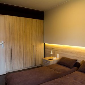 Sypialnia w apartamencie Cynamon