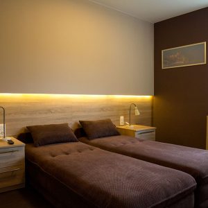 Sypialnia w apartamencie Cynamon